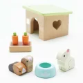 ME045-bunny-and-guinea-eating-from-food-bowl.jpg